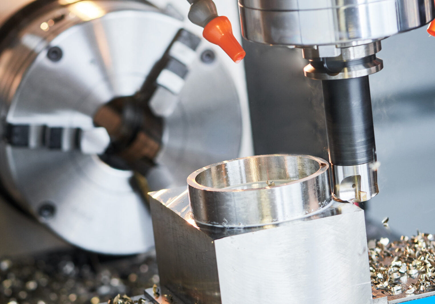 Milling metalworking process. Industrial precision CNC metal machining by vertical cutting mill